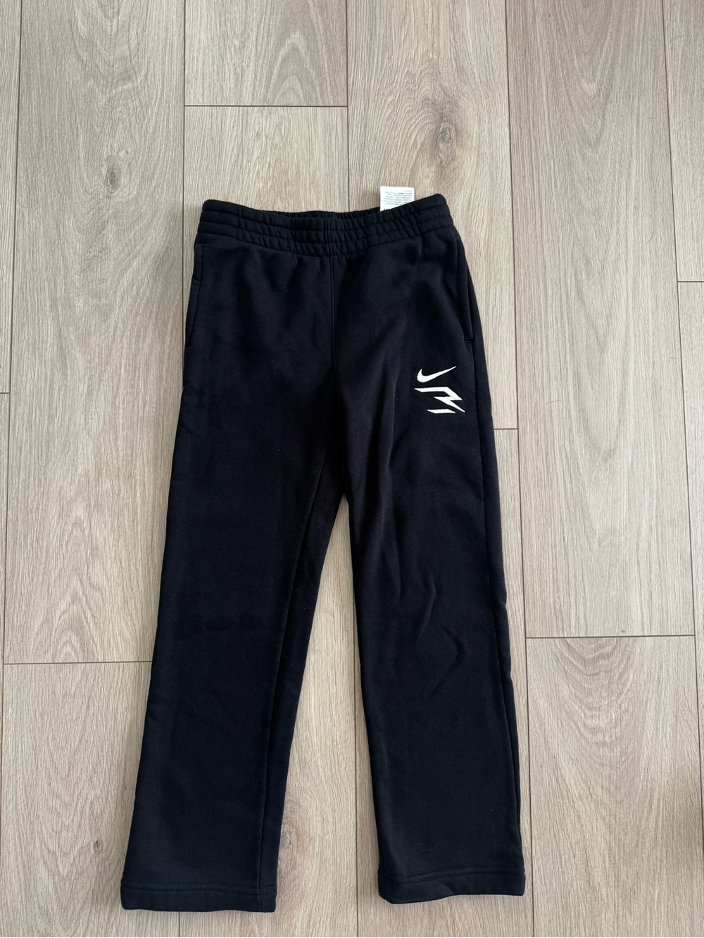 Nike Kids Black Jogger Sweatpants with White Swoosh